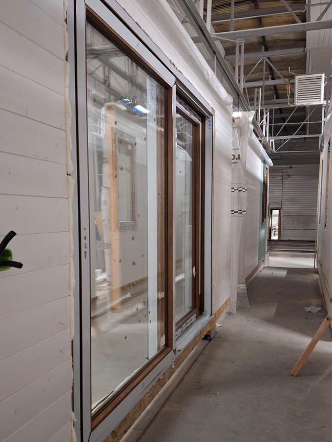 Edificio prefabbricato in legno Ecodimora a San Felice del Benaco Brescia produzione parete