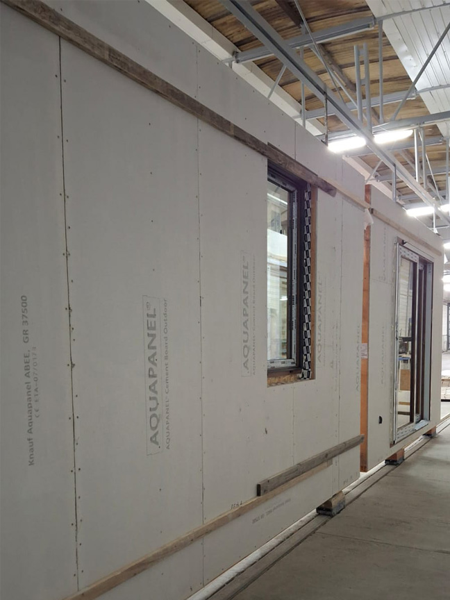 Edificio prefabbricato in legno Ecodimora a San Felice del Benaco Brescia produzione parete